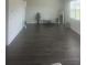 Spacious living room with dark hardwood floors at 266 Broder Farms Dr, Stockbridge, GA 30281