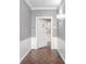 Bright entryway with hardwood floors and white door at 2769 Peachtree Ne Rd # 10, Atlanta, GA 30305