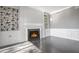 Spacious living room with fireplace and built-in shelving at 2769 Peachtree Ne Rd # 10, Atlanta, GA 30305