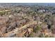 Aerial view of the property and surrounding neighborhood, highlighting its location at 4035 Powerscourt Pl, Suwanee, GA 30024