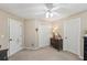 Bedroom with double door closet and dresser at 4035 Powerscourt Pl, Suwanee, GA 30024