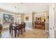 Cozy breakfast nook with a view into the Gathering room and access to the kitchen at 4035 Powerscourt Pl, Suwanee, GA 30024