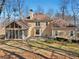 Two-story house with screened porch and patio at 4035 Powerscourt Pl, Suwanee, GA 30024