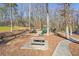 Community playground in wooded area at 4035 Powerscourt Pl, Suwanee, GA 30024