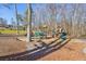 Community playground with playset and picnic table at 4035 Powerscourt Pl, Suwanee, GA 30024