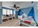 bedroom featuring a colorful design, window seat, and built-in bookshelves at 976 Forest Pond Cir, Marietta, GA 30068