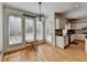 Breakfast nook adjacent to the kitchen has hardwood floors and lots of natural light from the large windows at 976 Forest Pond Cir, Marietta, GA 30068