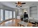 Bright home office with custom built-ins, multiple desks, and large windows at 976 Forest Pond Cir, Marietta, GA 30068