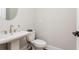 Bathroom featuring a modern sink, toilet, and elegant fixtures at 1371 Walking Way, Atlanta, GA 30316