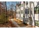 Scenic view of new townhomes with lush landscaping and inviting walkways at 1371 Walking Way, Atlanta, GA 30316