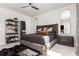 Spacious bedroom showcasing modern design, a ceiling fan, sleek decor, and a stylish accent rug at 1371 Walking Way, Atlanta, GA 30316