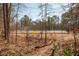 Community tennis court surrounded by trees, offering a peaceful recreational space at 1371 Walking Way, Atlanta, GA 30316