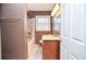 Bathroom featuring a shower-tub combination, window, and vanity with granite countertop at 2265 Pine Point Dr, Lawrenceville, GA 30043