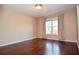 Cozy bedroom with hardwood floors and natural light at 2265 Pine Point Dr, Lawrenceville, GA 30043