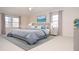 Virtual staging of primary bedroom with stylish decor and neutral color palette at 2265 Pine Point Dr, Lawrenceville, GA 30043