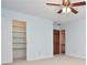 Bedroom featuring a closet, neutral carpet, and an open closet at 2265 Pine Point Dr, Lawrenceville, GA 30043