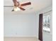 Bedroom with ceiling fan, tan carpet and a double window at 2265 Pine Point Dr, Lawrenceville, GA 30043