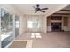 Open-concept living space with fireplace and deck access at 2265 Pine Point Dr, Lawrenceville, GA 30043