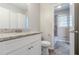 Inviting bathroom with updated granite-topped vanity, featuring access to the bath/shower combo at 2600 Burkshire Rd, Ellenwood, GA 30294