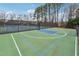 Community basketball and tennis courts, fostering an active and social neighborhood environment at 4035 Crabapple Lake Ct, Roswell, GA 30076