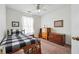 This bedroom features a twin bed and wood furnishings at 4035 Crabapple Lake Ct, Roswell, GA 30076