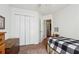 Bedroom featuring a twin bed, carpet, and closet at 4035 Crabapple Lake Ct, Roswell, GA 30076