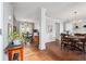 Open-concept dining area with hardwood floors and ample natural light at 4035 Crabapple Lake Ct, Roswell, GA 30076