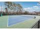 Well-maintained community tennis courts for active recreation and community engagement at 4035 Crabapple Lake Ct, Roswell, GA 30076