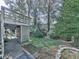 Spacious backyard with deck and mature trees at 6790 Fairways Dr, Douglasville, GA 30134