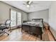 Well-lit bedroom with hardwood floors and ceiling fan at 6790 Fairways Dr, Douglasville, GA 30134