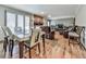 Bright dining area with hardwood floors and view of living room at 6790 Fairways Dr, Douglasville, GA 30134