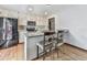 Kitchen island with granite countertops and breakfast bar at 6790 Fairways Dr, Douglasville, GA 30134