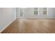 Bright dining room with hardwood floors and access to patio at 702 Smokey Quartz Way, Kennesaw, GA 30144