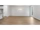 Bright dining room with hardwood floors and chandelier at 702 Smokey Quartz Way, Kennesaw, GA 30144