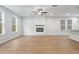 Spacious living room with hardwood floors and fireplace at 702 Smokey Quartz Way, Kennesaw, GA 30144