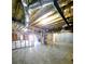 View of unfinished basement with exposed ductwork, insulation and framed walls at 866 Lee Byrd Rd, Loganville, GA 30052