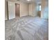 Spacious bedroom with large windows and neutral-toned walls at 866 Lee Byrd Rd, Loganville, GA 30052