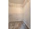 Walk-in closet with carpet and white wire shelving for efficient organization at 866 Lee Byrd Rd, Loganville, GA 30052