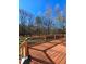 Spacious wooden deck with dark railings, perfect for outdoor entertaining at 866 Lee Byrd Rd, Loganville, GA 30052