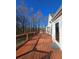 Expansive wooden deck with backyard views and access to home at 866 Lee Byrd Rd, Loganville, GA 30052