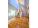 Bright entryway boasts hardwood floors, staircase, and soaring ceilings at 866 Lee Byrd Rd, Loganville, GA 30052
