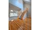 Spacious entryway with hardwood floors and stairwell to the second story at 866 Lee Byrd Rd, Loganville, GA 30052