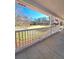 Covered front porch with white railings and a view of the front yard at 866 Lee Byrd Rd, Loganville, GA 30052