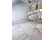 Open living room with cathedral ceiling and second story balcony at 866 Lee Byrd Rd, Loganville, GA 30052