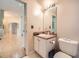 The bathroom features a single sink vanity, toilet, and neutral wall color at 1342 Orchard Park Dr, Stone Mountain, GA 30083