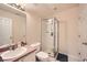 A full bathroom features a shower, toilet, single-sink vanity, and a mirror at 1342 Orchard Park Dr, Stone Mountain, GA 30083