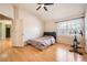 Comfortable bedroom with hardwood floors and a bright window view at 1342 Orchard Park Dr, Stone Mountain, GA 30083