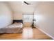 Cozy bedroom features natural light, hardwood floors, and a comfortable atmosphere at 1342 Orchard Park Dr, Stone Mountain, GA 30083