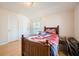 Charming bedroom with wood floors and great natural light at 1342 Orchard Park Dr, Stone Mountain, GA 30083
