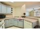 Charming kitchen boasts ample counter space and an open layout, perfect for entertaining at 1342 Orchard Park Dr, Stone Mountain, GA 30083